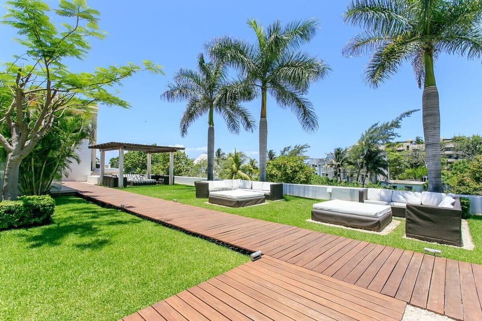 Enjoy the sun or the shade in the lounge area of the condo