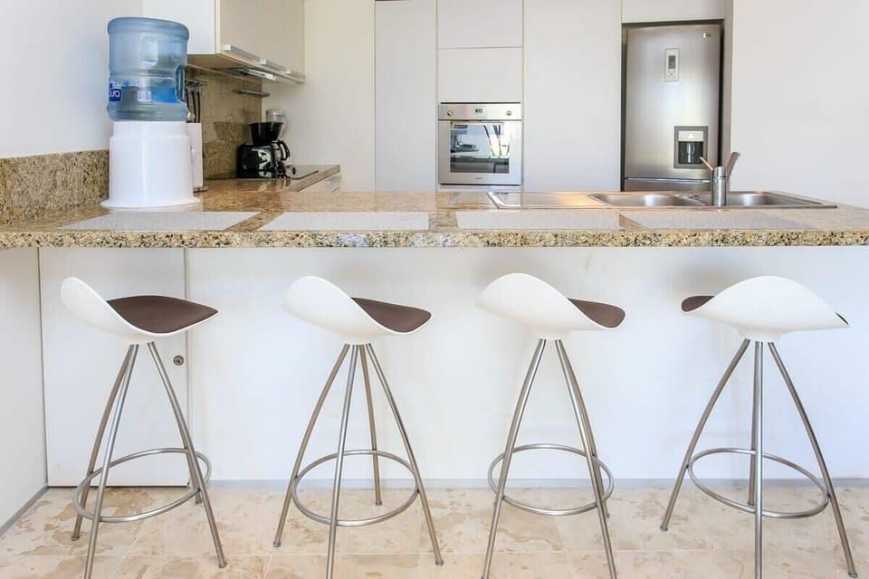 The breakfast bar serves as a place to eat and as a laptop-friendly workspace - if you must