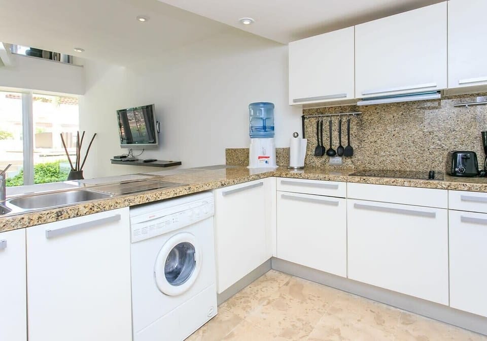 In the kitchen you can find the washer/dryer