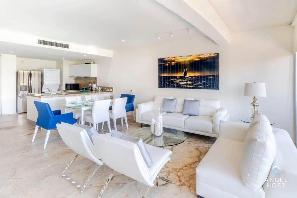 A beautifully designed open floor concept with an ultra-modern decor style
