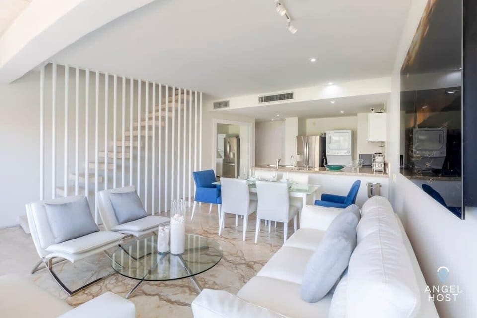 This area of the condo is inviting and thoughtfully designed for interaction and conversation