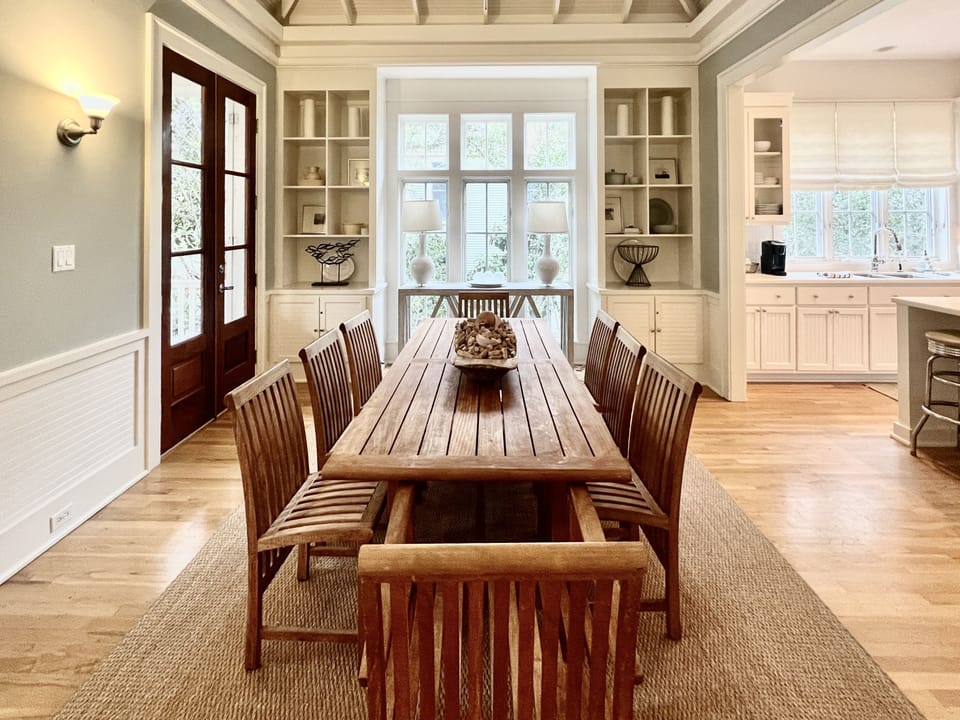 DINING AREA COMFORTABLY SEATS 8