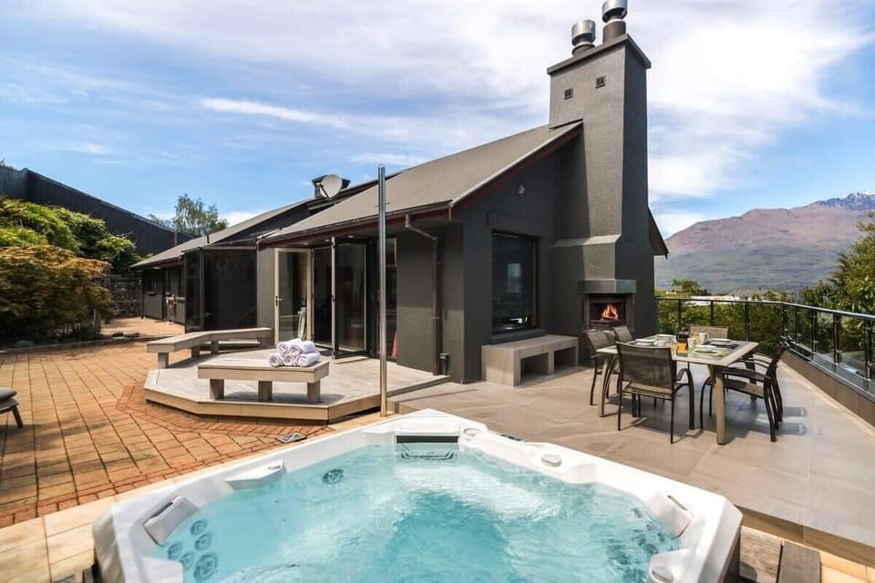 Outdoor Oasis: Revel in breathtaking views from your private spa and alfresco dining space!