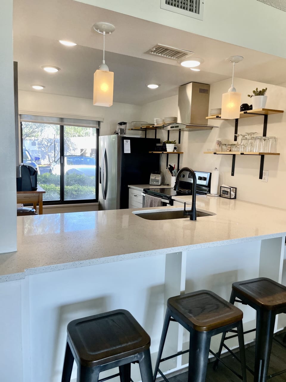 Breakfast bar to kitchen transition space. 