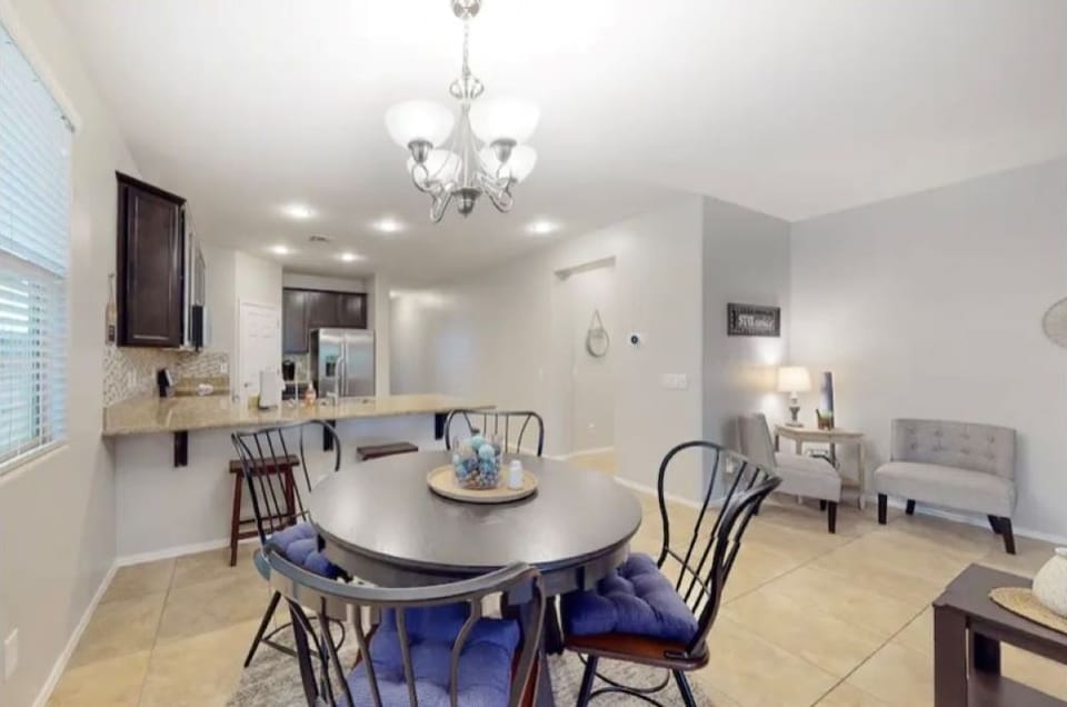Dining Table with 4 chairs | 2 more chairs are located in office & queen room