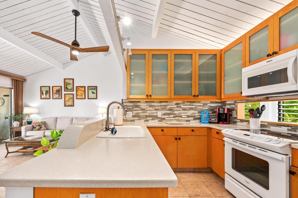 Plenty of room, under and over cabinet lighting, solid surface counters.