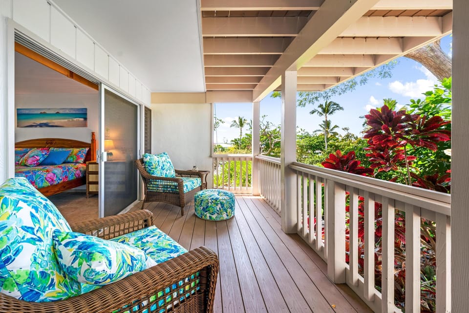 Just steps from your bed is the lower level private lanai, enjoy the cozy chairs