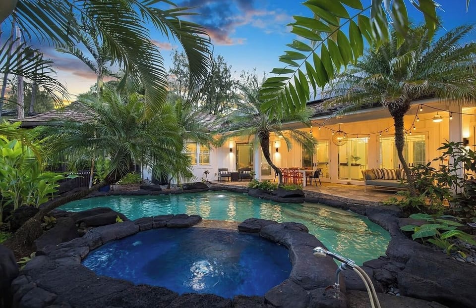 Beautifully landscaped tropical yard and pool with night lighting!