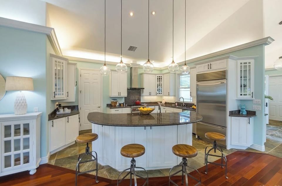 Gourmet kitchen with high end appliances.