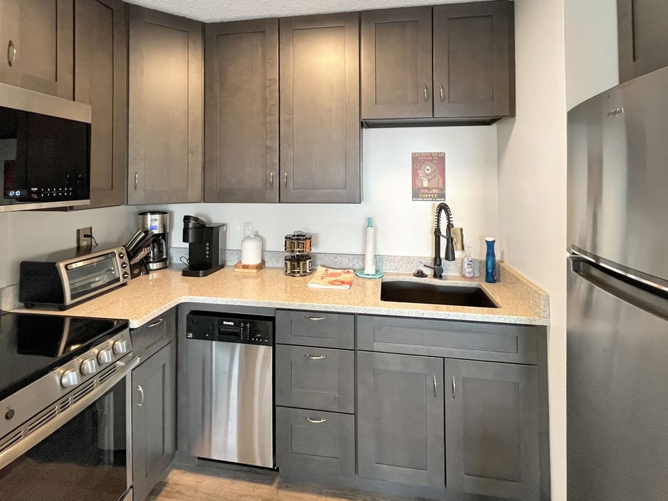 Enjoy the fully stocked kitchen, Fridge, Keurig, coffee maker, microwave
