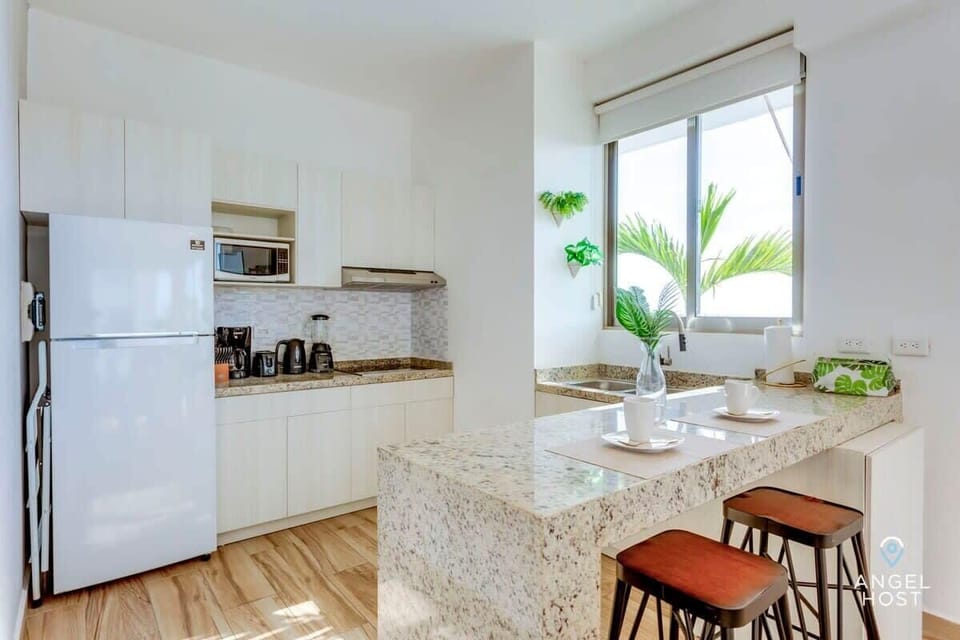 The breakfast bar can also serve as a laptop-friendly workspace