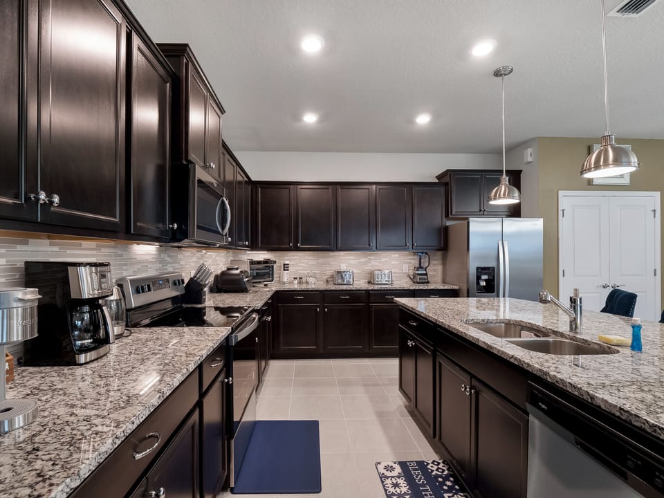 Beautiful, stocked kitchen with ample counter space and new appliances