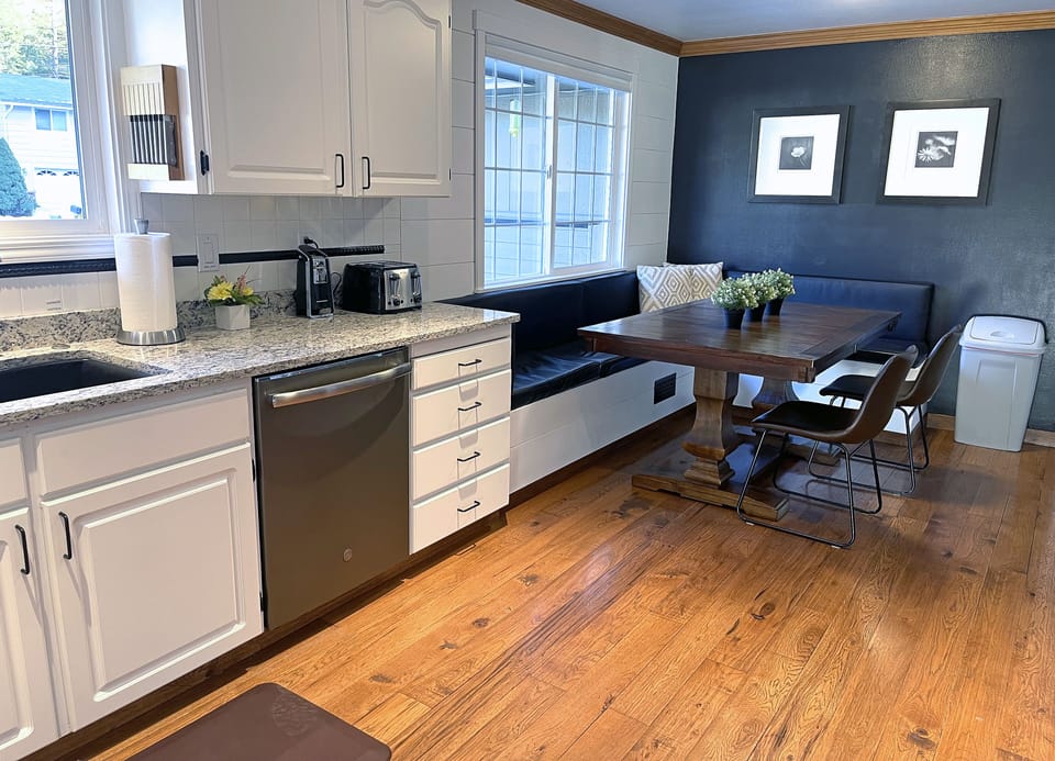 NEW Kitchen includes S/S Dishwasher, Granite Sink.  Breakfast nook table seats 7