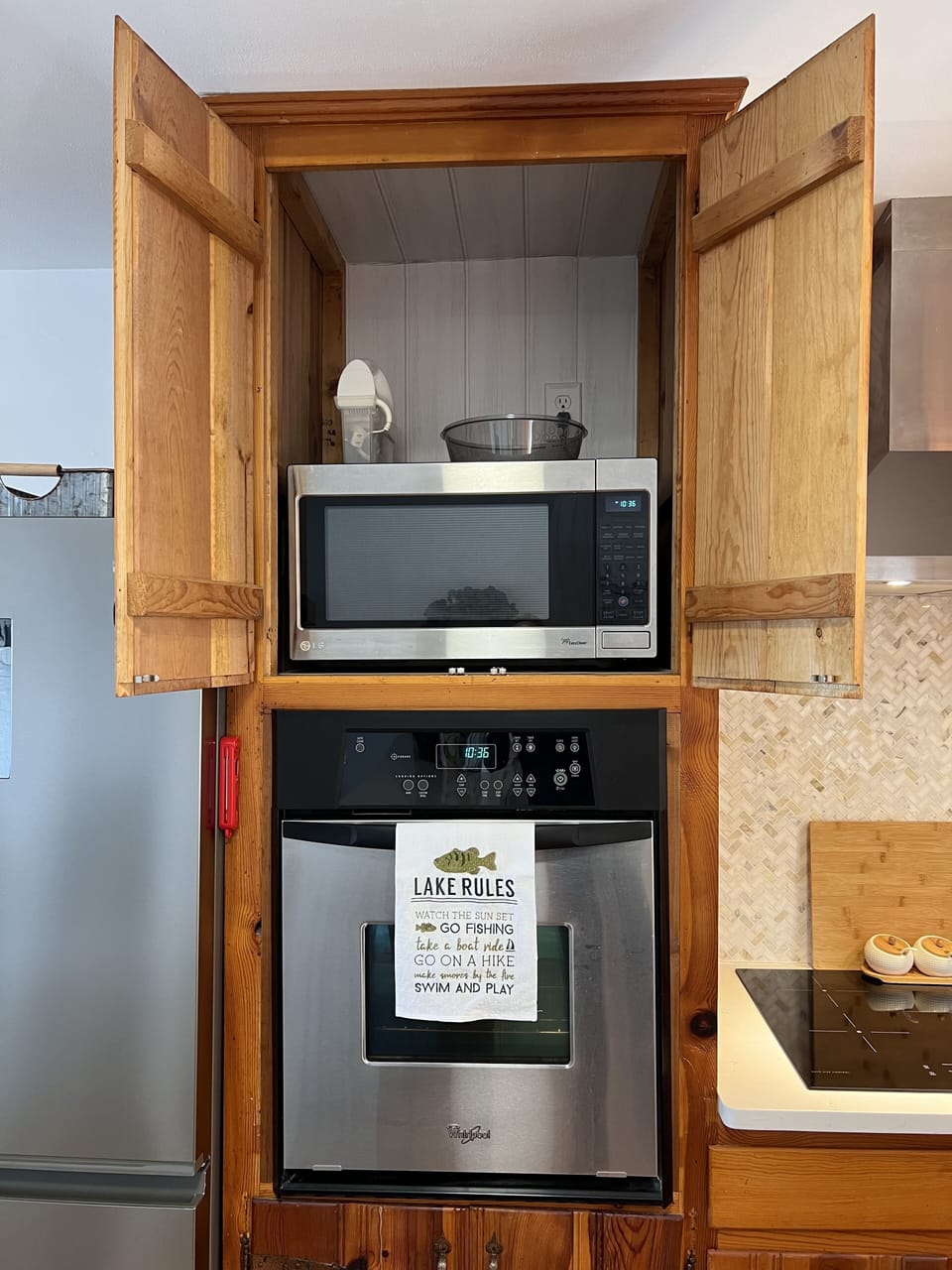 Microwave is hiding over the oven.