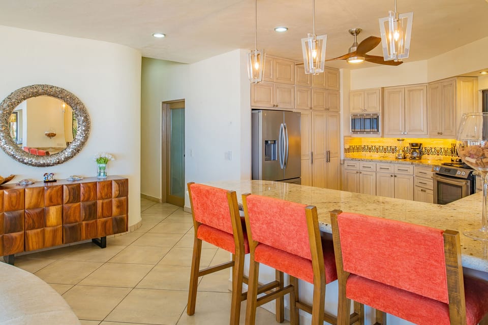 Fully equipped kitchen with bar seating