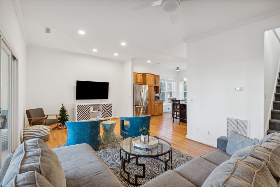 Living room leads into the Kitchen