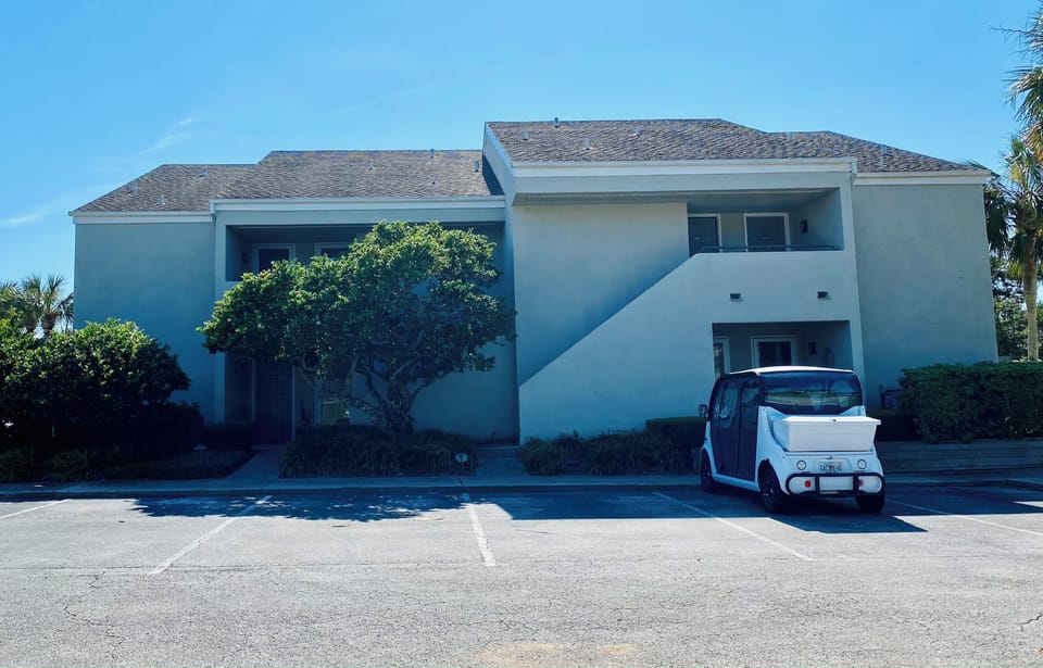 Front of condo area. Two unassigned parking spaces
