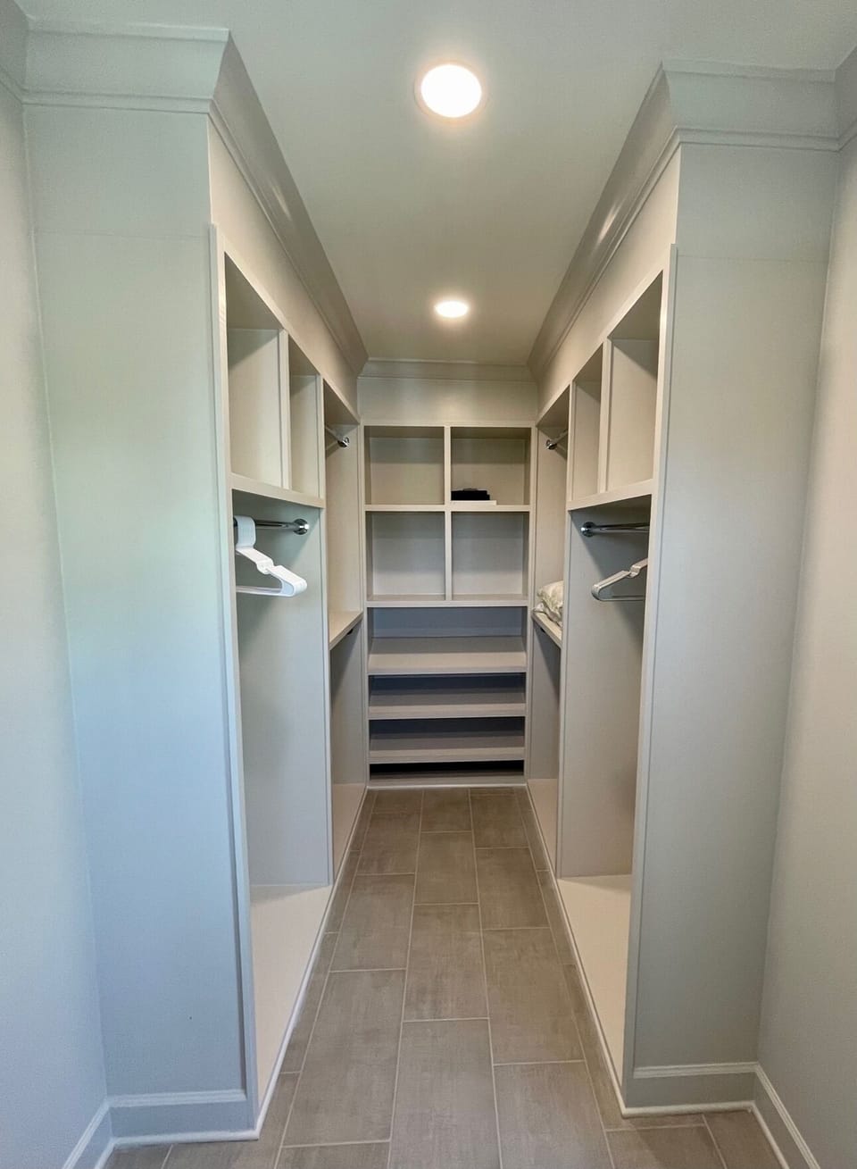 Master Closet Main w/ his and her sides and shoe storage