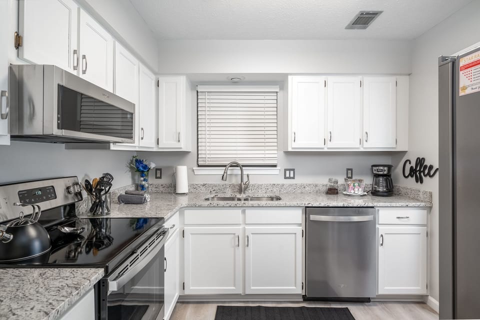 New appliances, granite countertops, lots of cooking  utensils. LED lighting.
