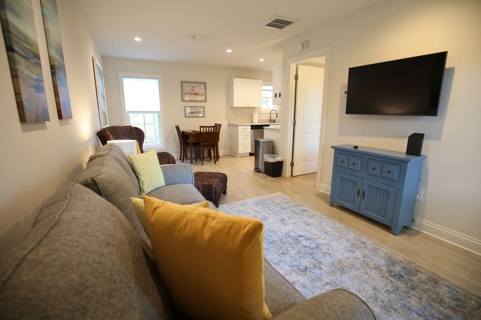 A 43" smart TV to log into your own apps. Games are located in the blue cabinet.