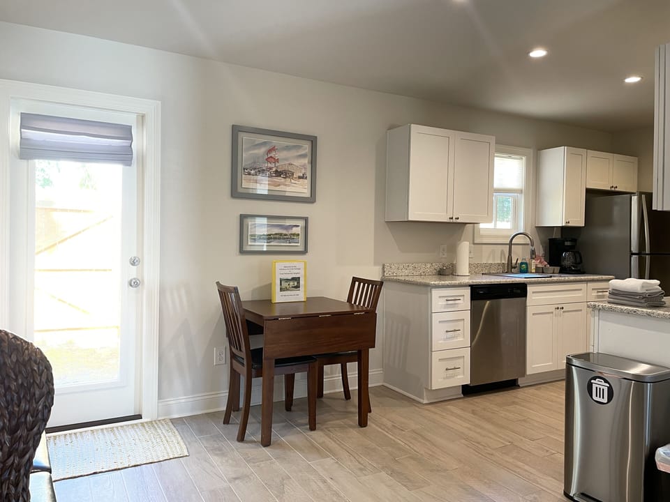 View of the dining area and kitchen.