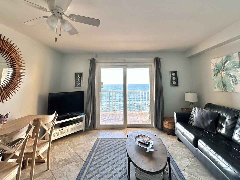 Enjoy the Gulf view while prepping meals, relaxing on the couch or the balcony.