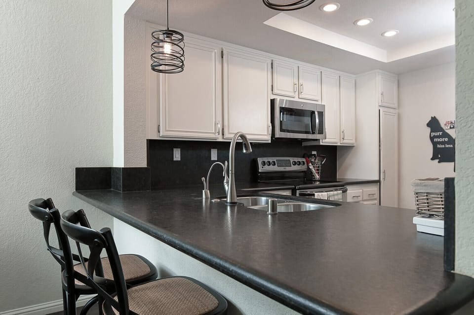 counter height sitting overlooking kitchen
