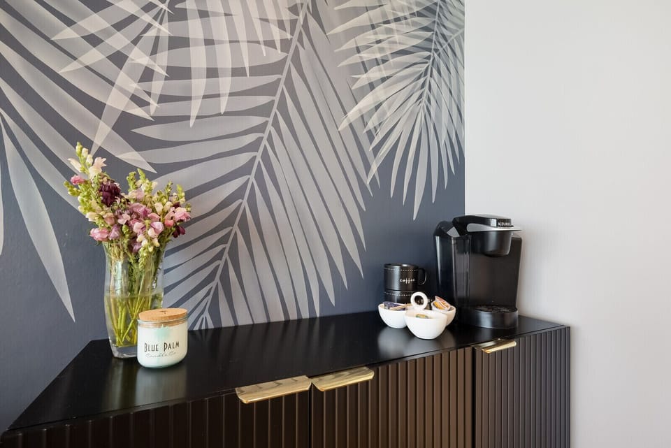 In-suite coffee bar in primary bedroom