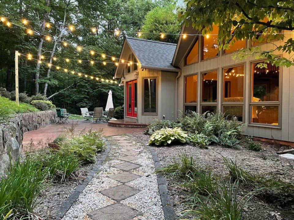 Back patio for relaxing with a glass of wine; has table w/ chairs, grill, fire pit and small water fountain that burbles peacefully
