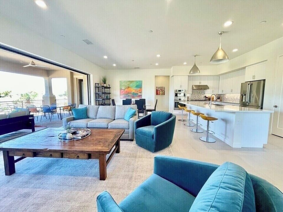 Indoor outdoor living with views of the golf course and mountains!