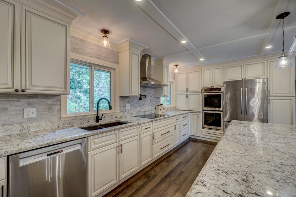 Fully stocked kitchen, high end appliances, wide walkway for multiple cooks.