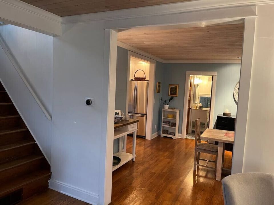 First floor stairs upstairs and hallway to dining room