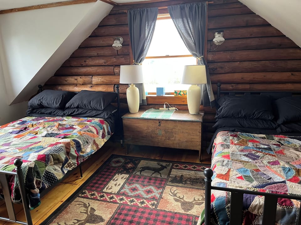 Upstairs guest bedroom with 2 full size beds