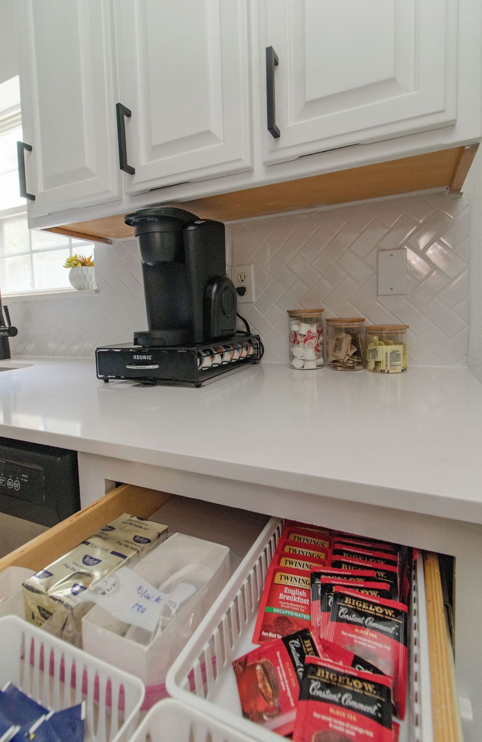 Keurig machine with a selection of coffee and tea