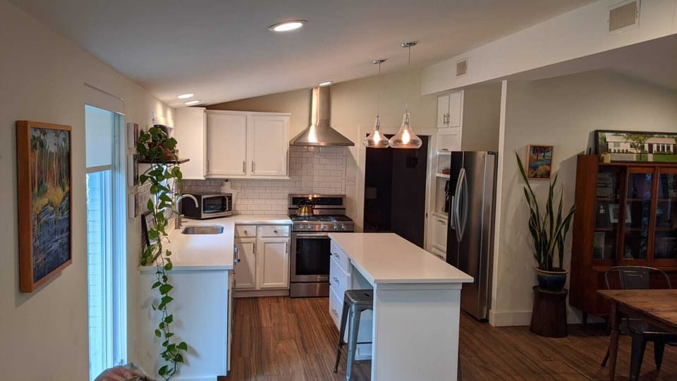 Full view of the kitchen with a peak of the the dining area 
