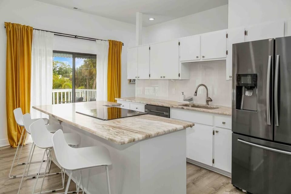 kitchen counter with stools