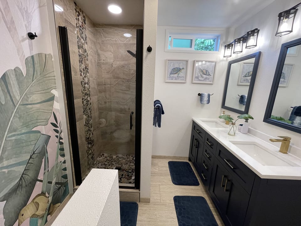 Newly remodeled master bathroom features double vanity