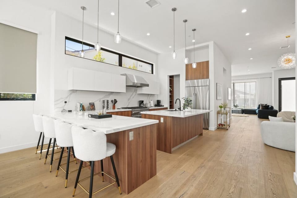 Gourmet kitchen with island & marble counters