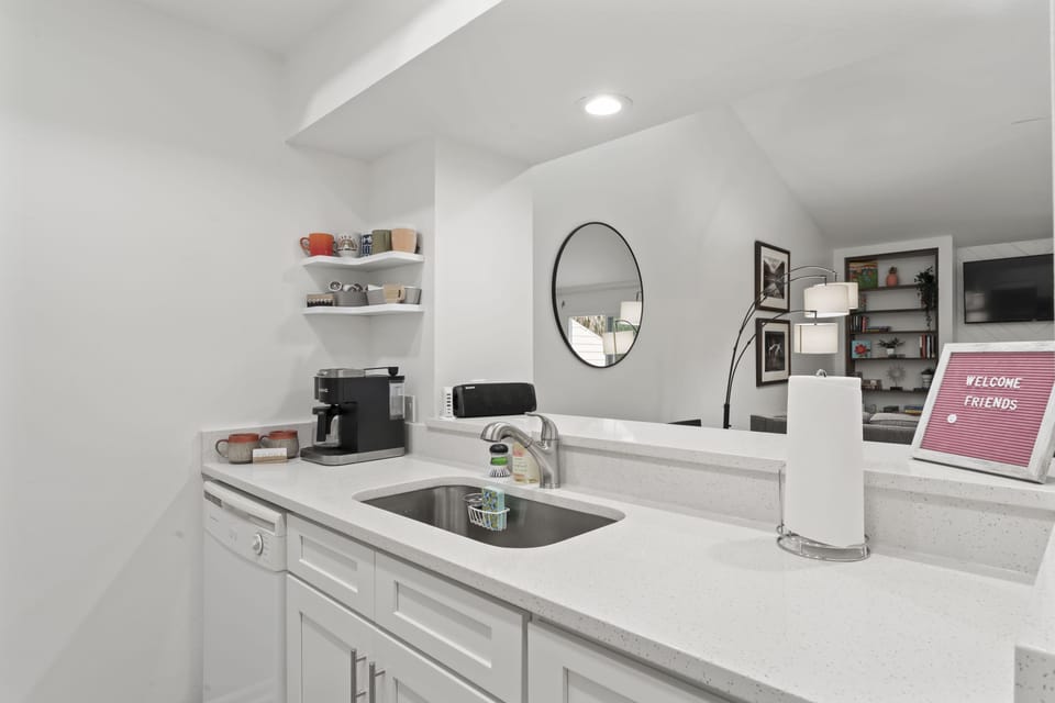 Kitchen overlooks dining/living areas