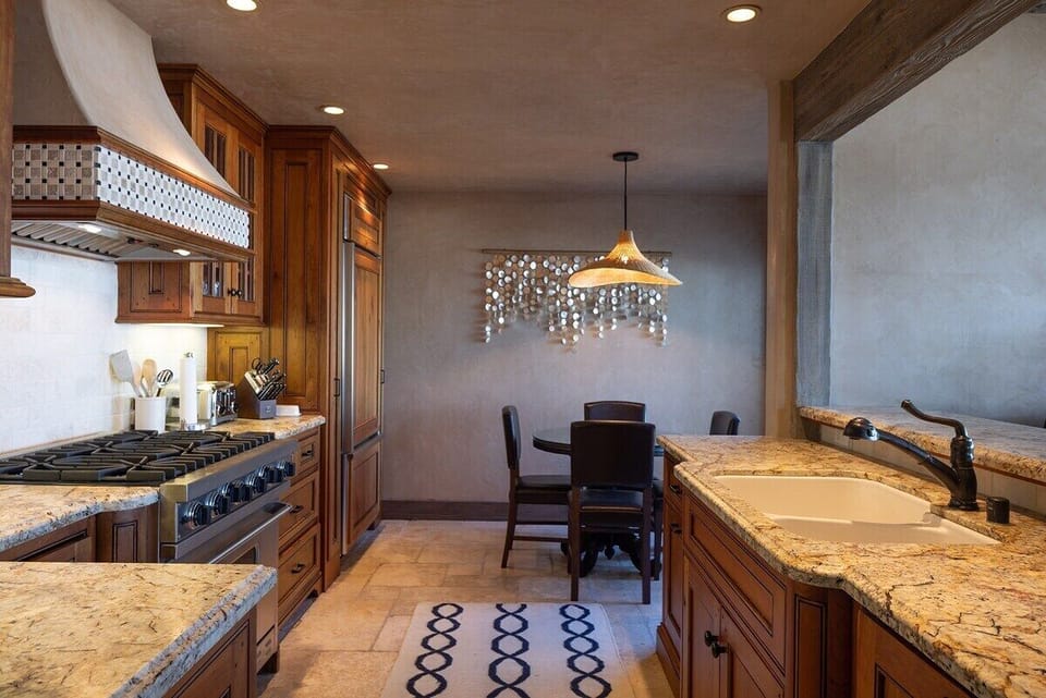 Fully appointed kitchen with 6 burner gas stove, dishwasher, wine fridge, coffeemaker & electric tea kettle.