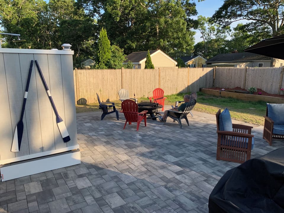 Patio with outside shower and fire pit