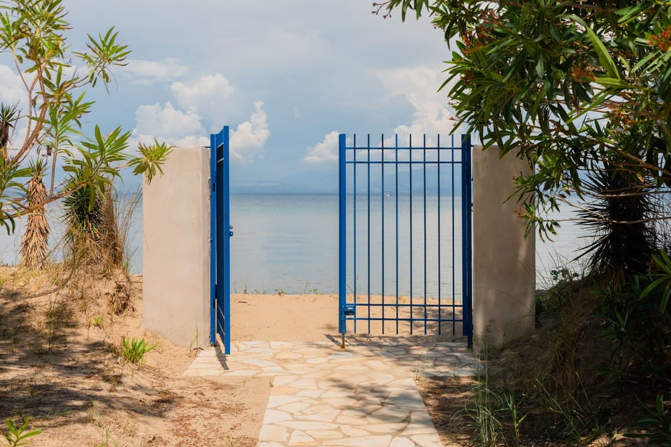 garden gate opens directly onto the beach
