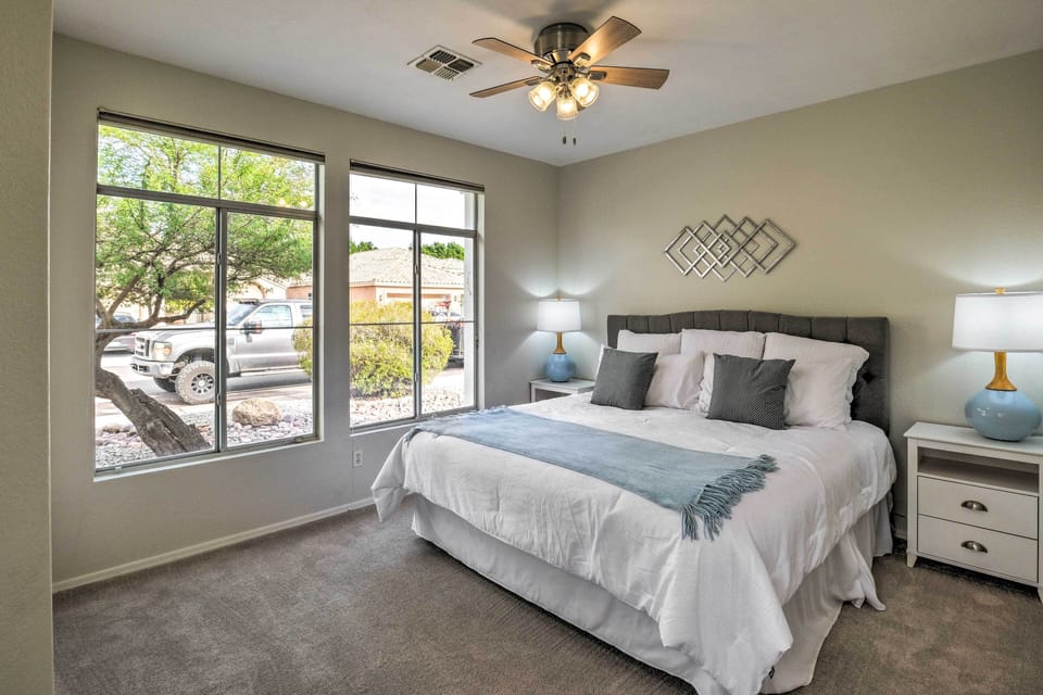 Fourth bedroom has a king size bed with bedside lights perfect for winding down.