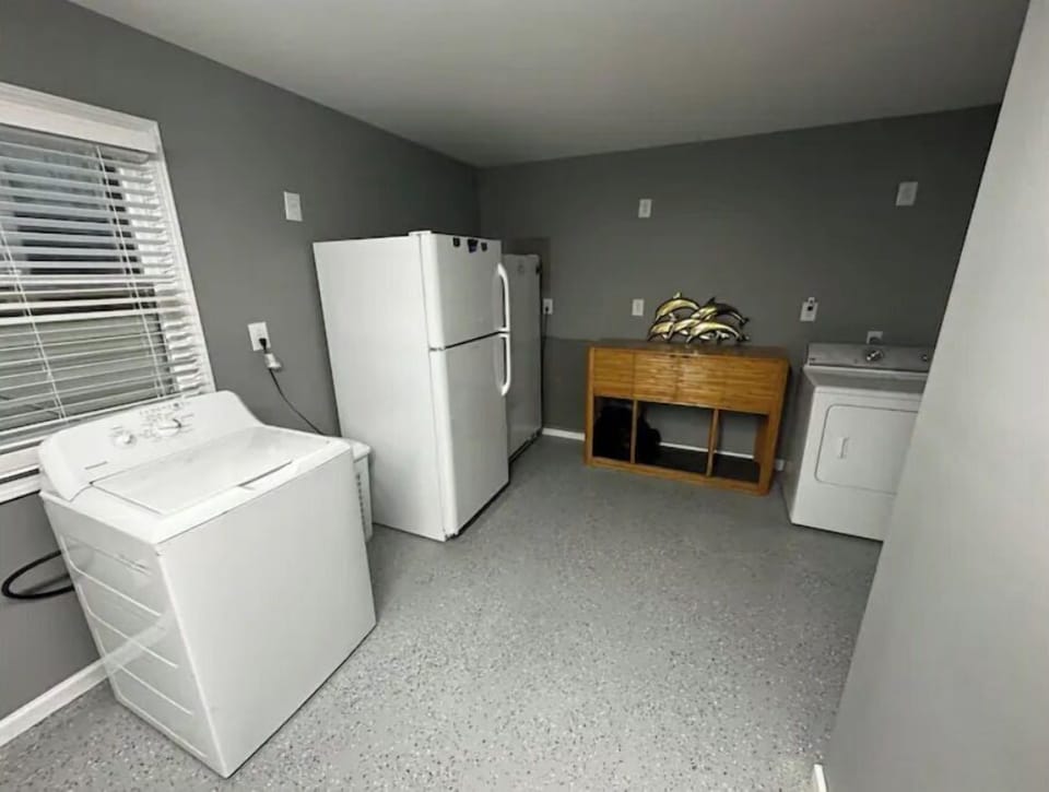 Washer and dryer, for your laundry needs, and an extra fridge and freezer!
