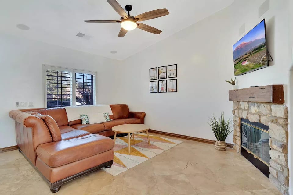 Make yourself at home on this cozy sectional couch, complete with a 50" smart tv