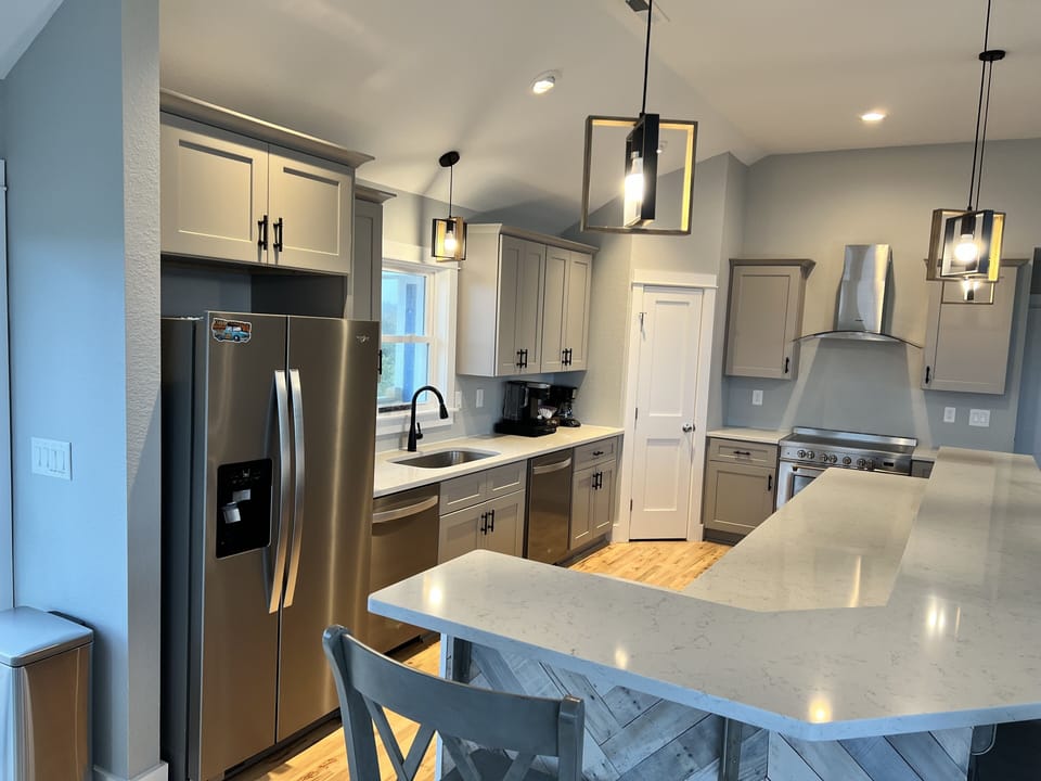 Two dishwashers, 36" cooktop stove, large pantry