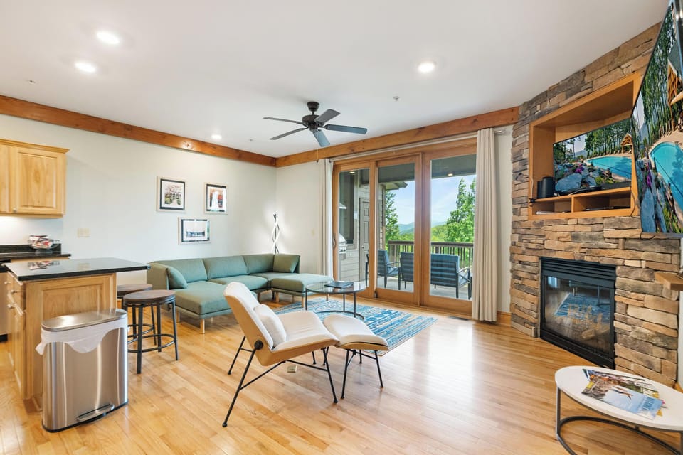 Living Room---Cozy Fireplace and TV's
