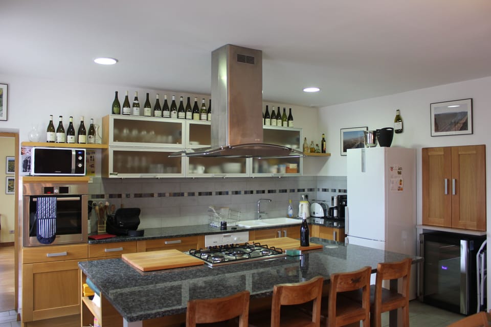 The kitchen is modern and very well equipped