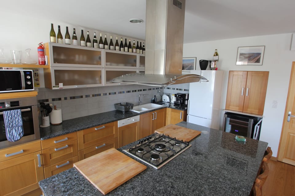 with lots of workspace and a very handy wine fridge