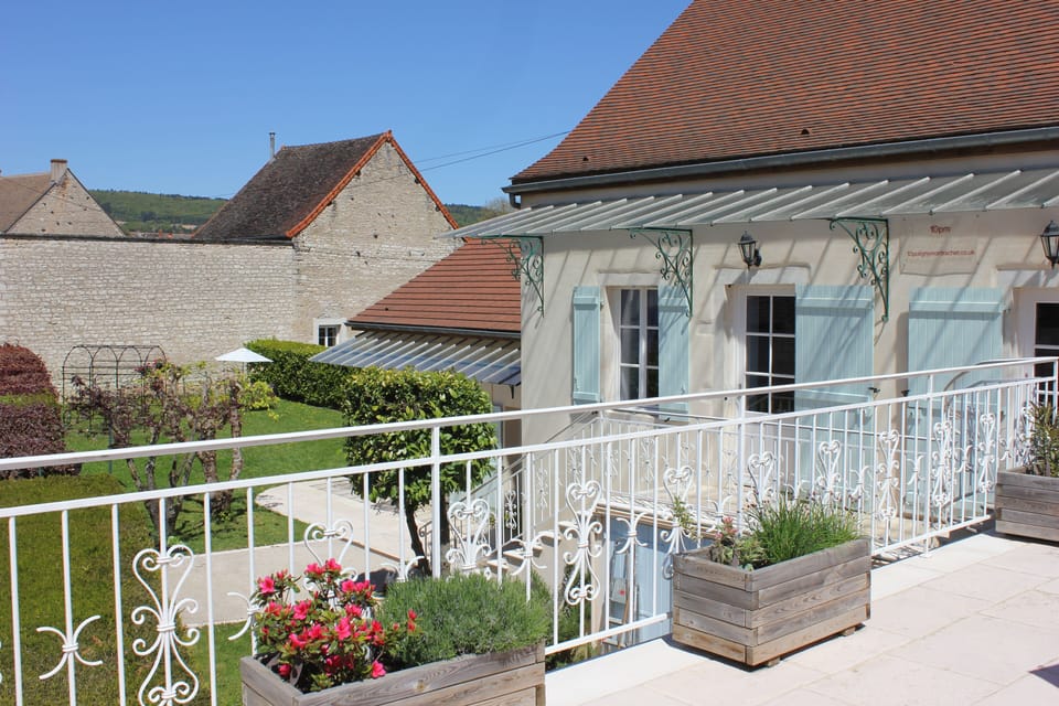 A large, traditional Burgundian house with enormous patio, and secluded garden